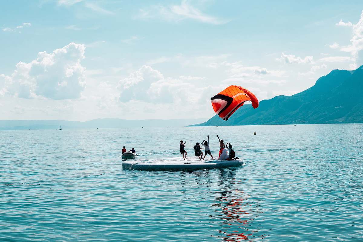 leisure activities people on boat on body of water gliding